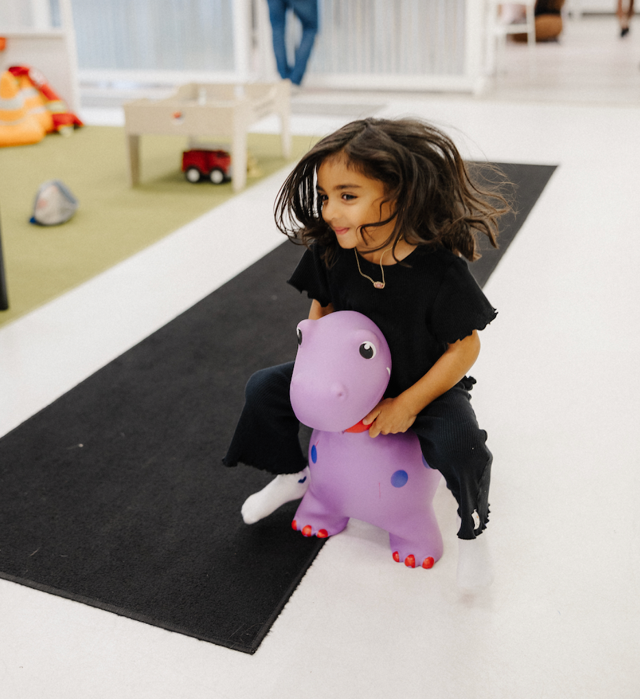 Children playing on gymnastics equipment